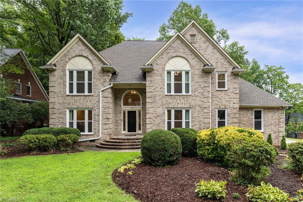 Image 1: Timeless brick-curb appeal with over 4000 sq ft.
