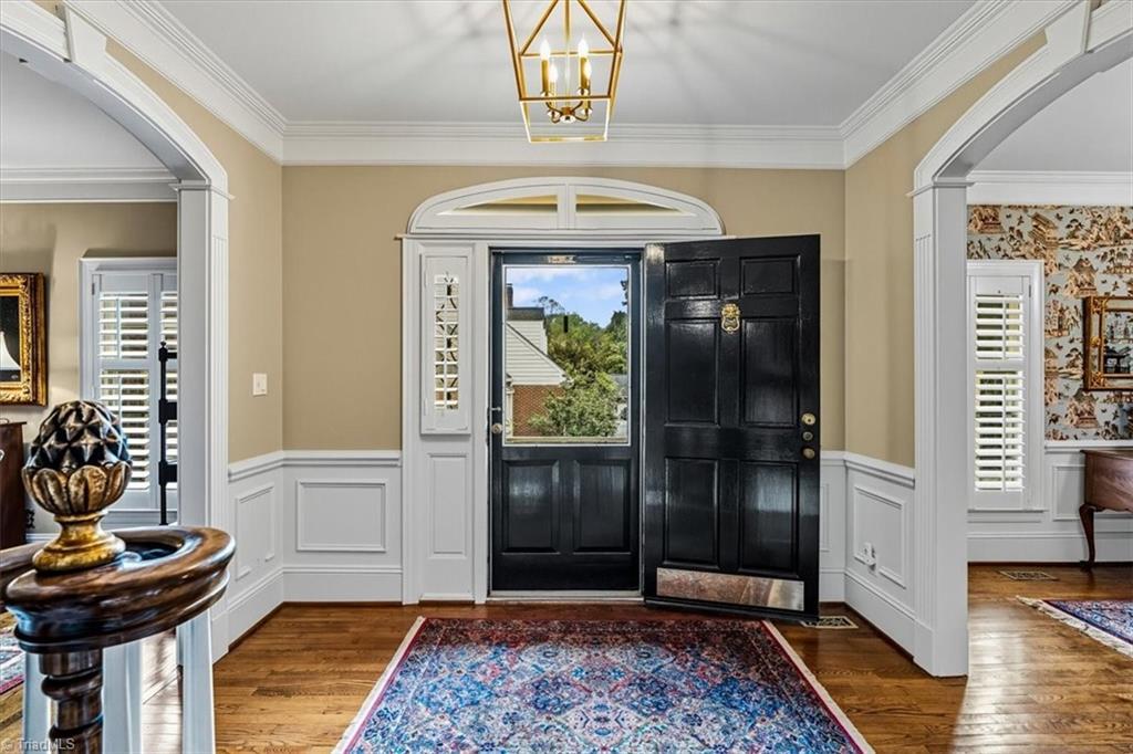 Image 2: Elegant foyer - new wainscotting and lighting