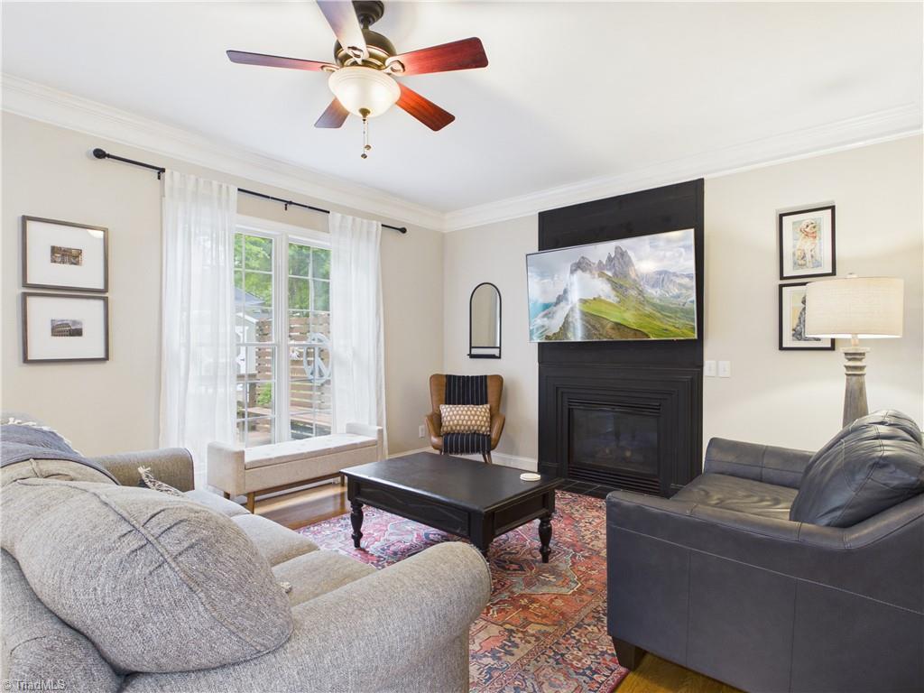 Image 4: Fantastic den featuring a fireplace and cozy are to gather