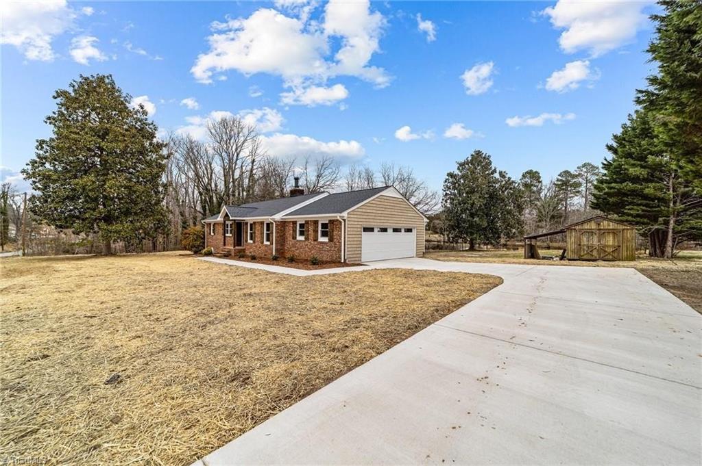 Image 3: This beautiful home also has a private pond perfect for fishing.