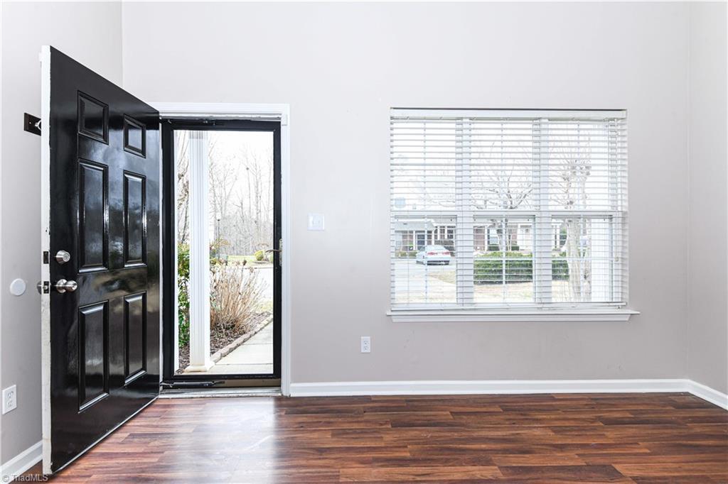 Image 3: Bright living area with tons of natural light.