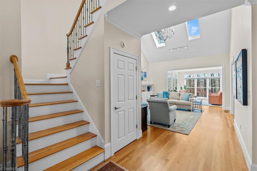 Image 2: Upon entering, the first thing you notice is the gleaming hardwoods.