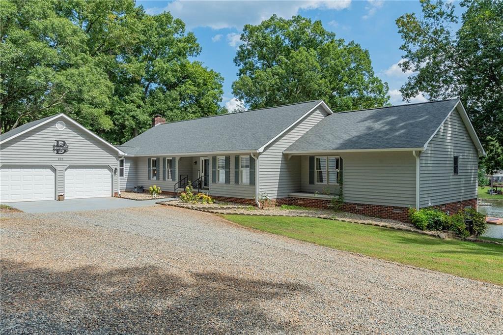 Image 4: Front side of House with Attached Garage