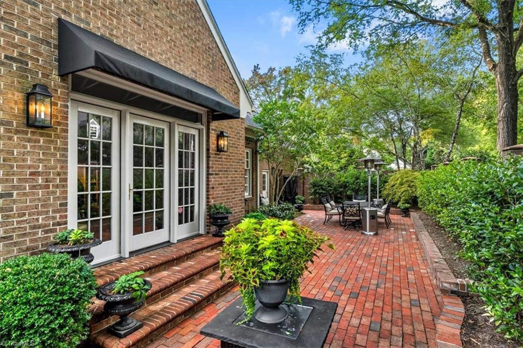 Image 3: Beautiful newly bricked private patio with all new landscaping