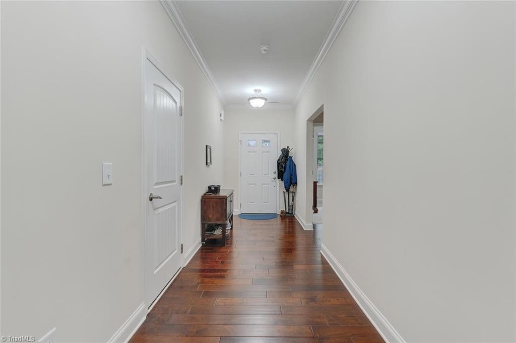 Image 4: Inviting foyer with beautiful engineered wood flooring
