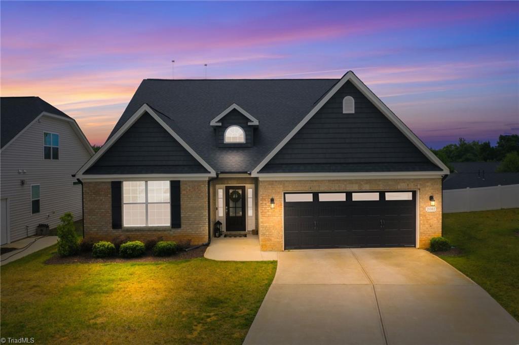 Image 1: Front Exterior with virtual dusk