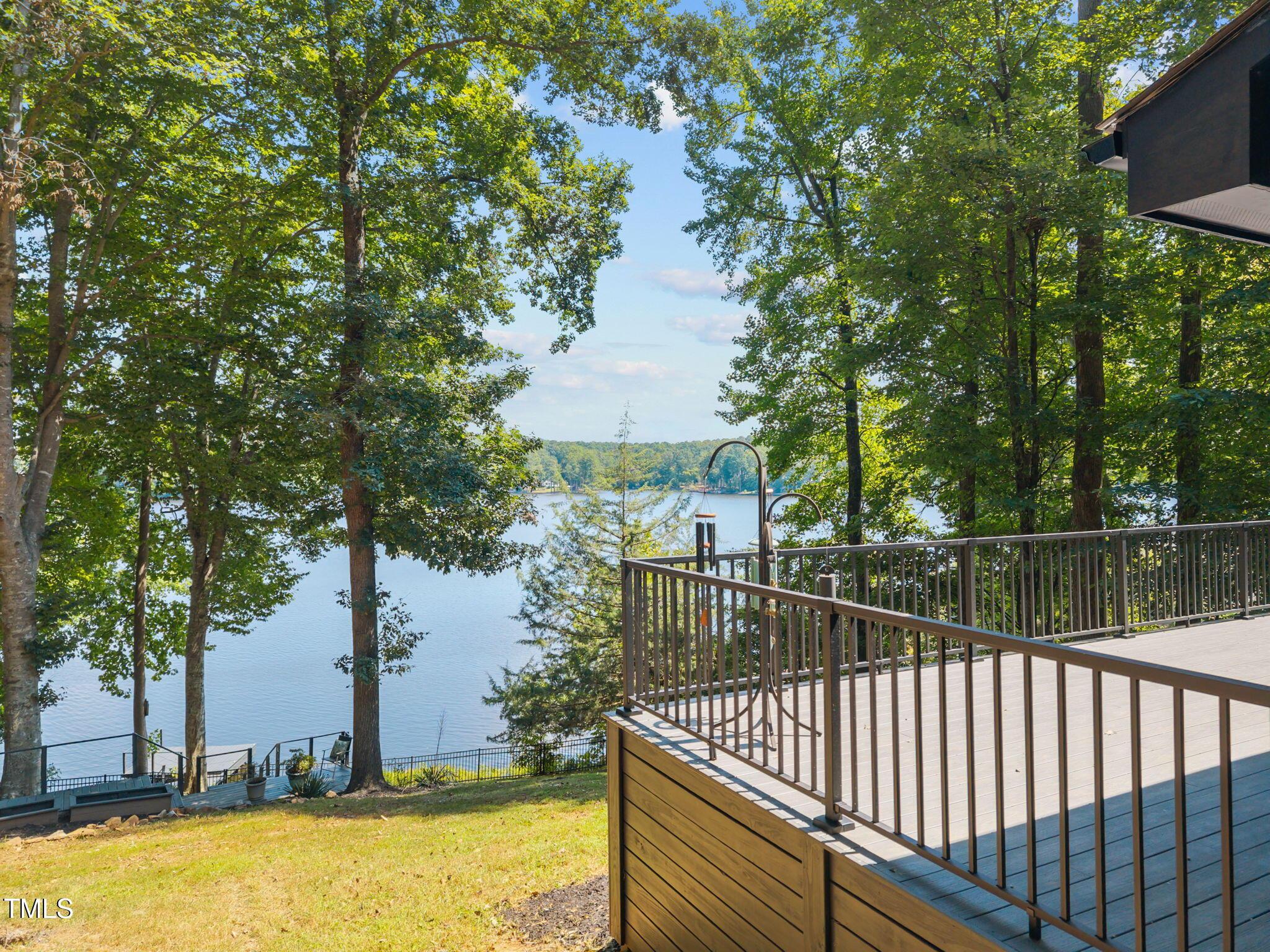 Image 1: Large Deck with Panoramic Water Views