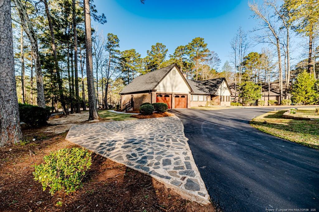 Image 1: Front Left Driveway View