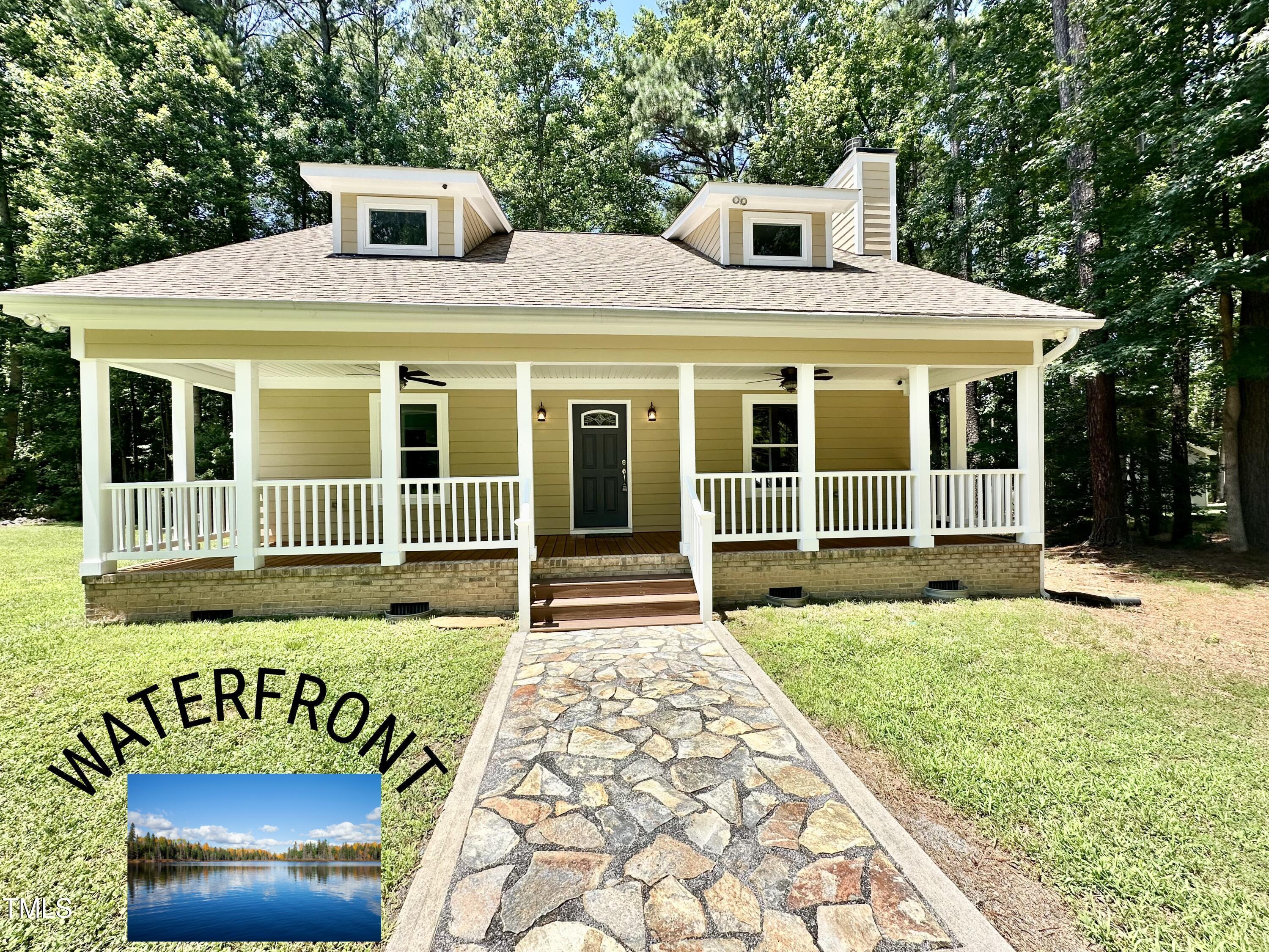 Image 1: Front of Lake House