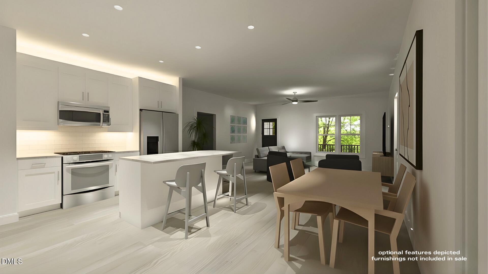 Image 3: Kitchen and Dining from Back Door