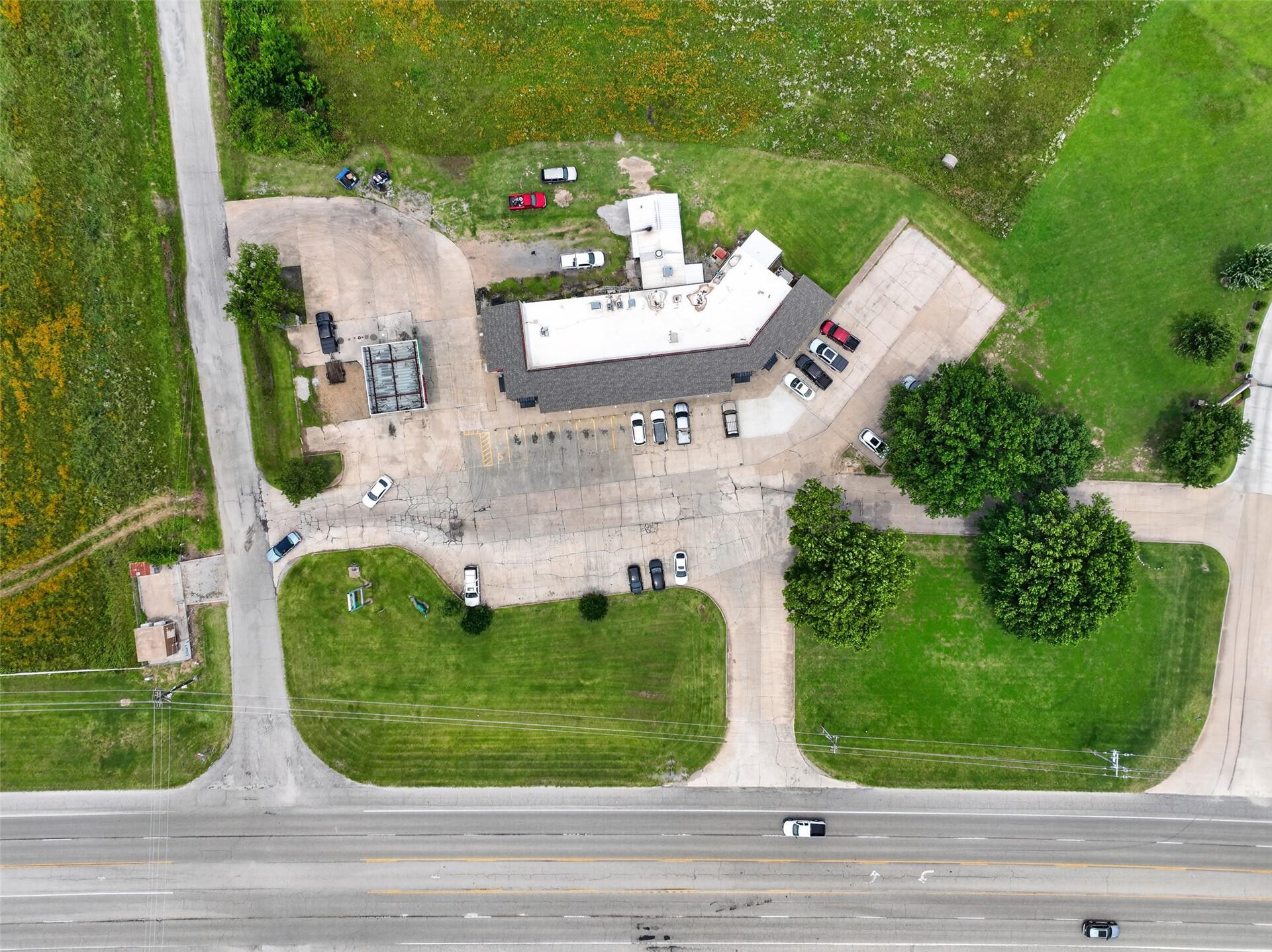 Image 4: Commercial property featuring multiple paved acces