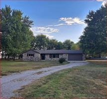203 N Will Rogers Loop W