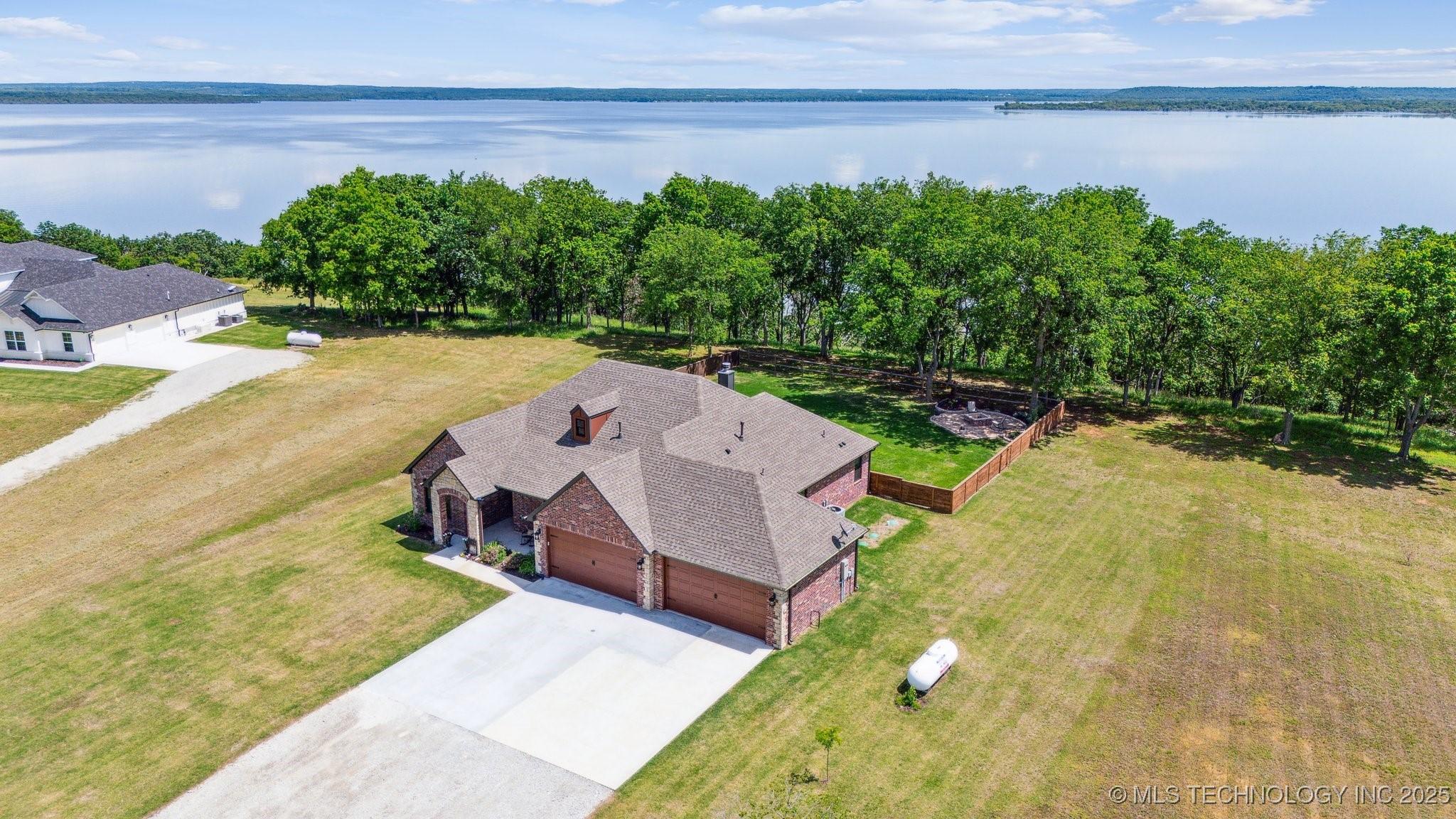 Image 1: Aerial view of the home- Lake Side