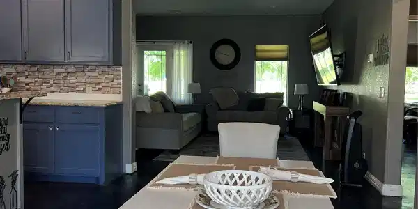 Image 4: Dining area opens into living area with plenty of