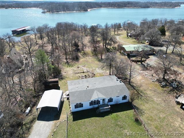 Image 1: Aerial View Of Home and Lake