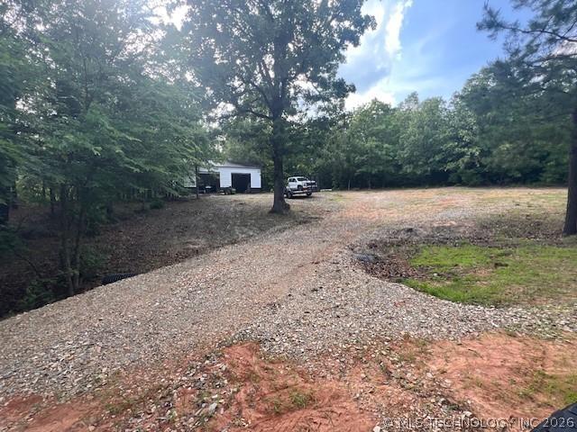 Image 4: Gravel drive leading to shop.