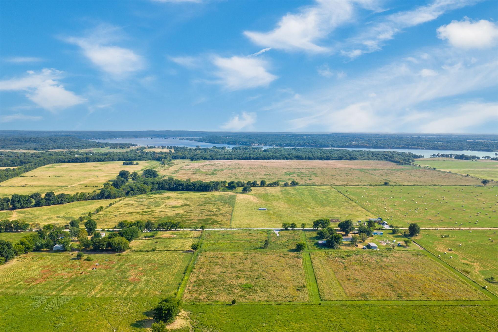 Image 4: Agricultural land featuring fences, mature tree li