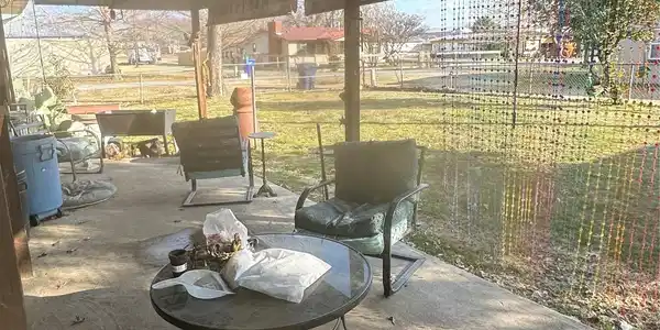 Image 4: LARGE COVERED PATIO IN THE BACK