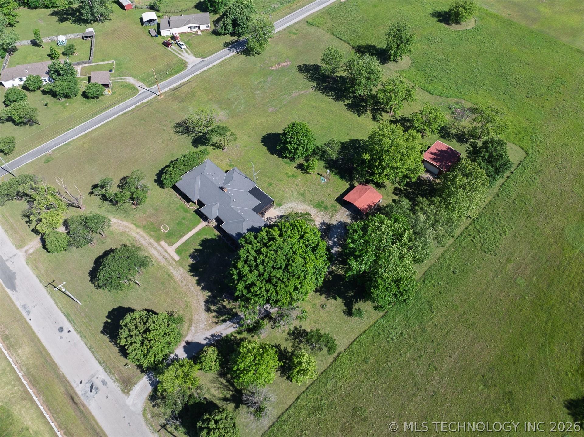 Image 2: Aerial of 4 acre site:
Home & 2 red top buildings