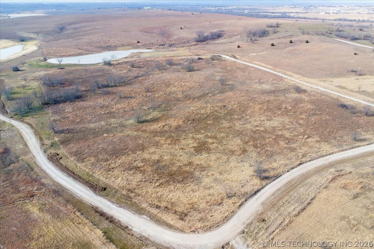 Image 3: Expansive rural landscape featuring two ponds