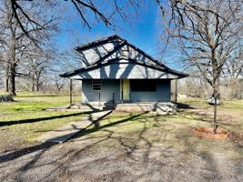 102 SE 605th