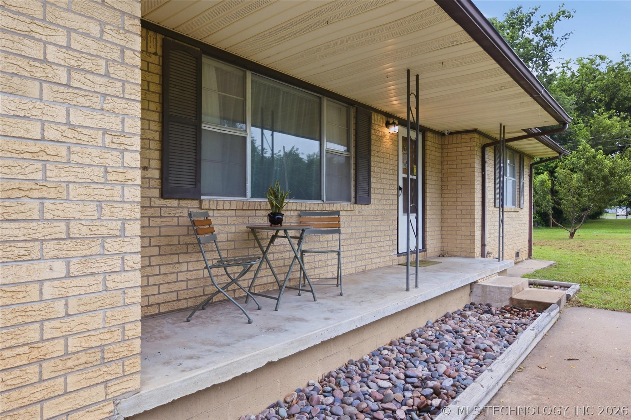 Image 2: Inviting Covered Front Porch