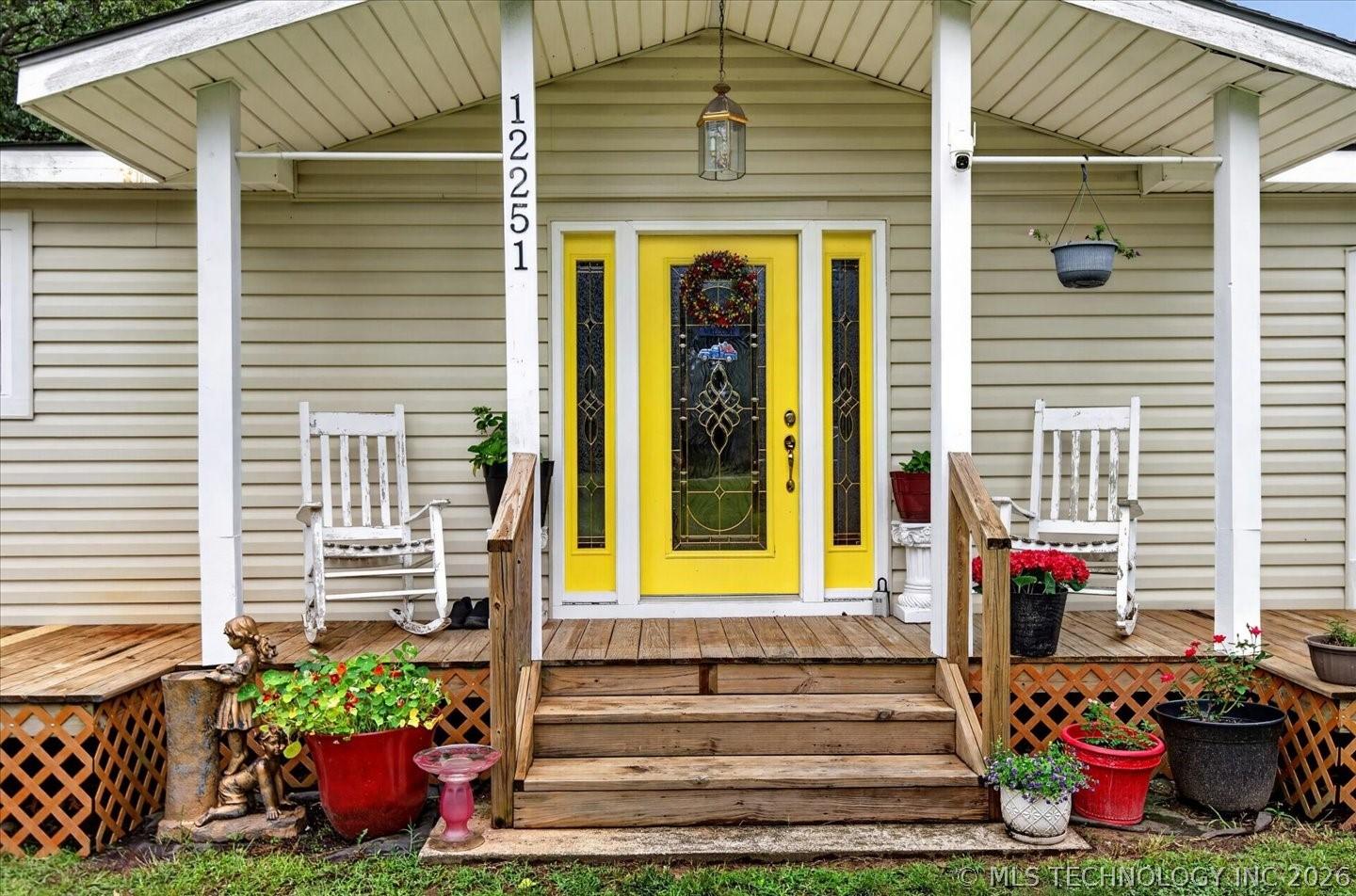Image 4: Covered front porch is perfect for rocking chairs