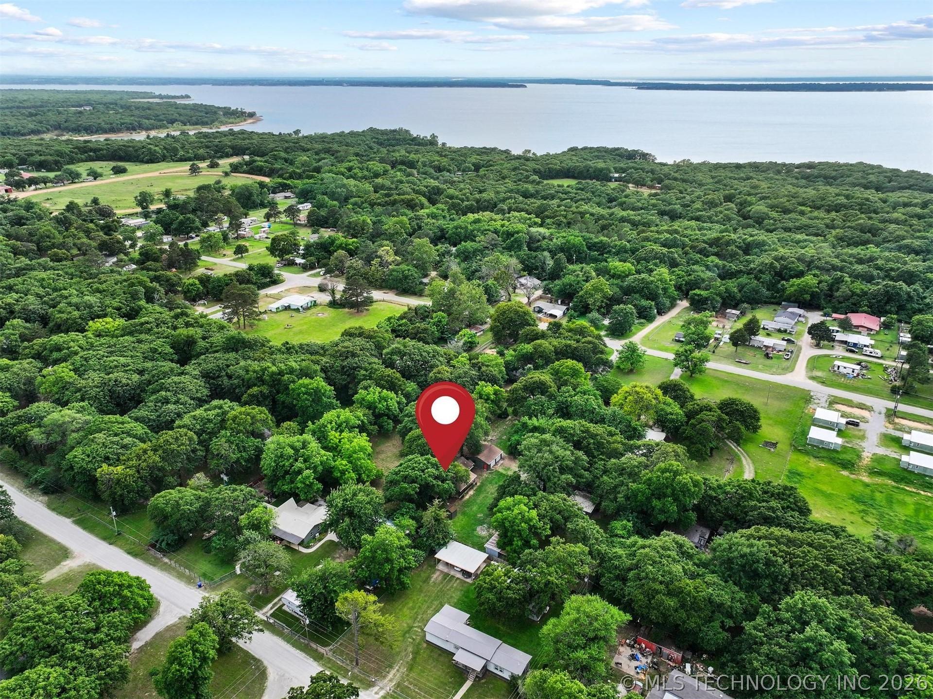 Image 4: Aerial perspective showcasing a verdant landscape