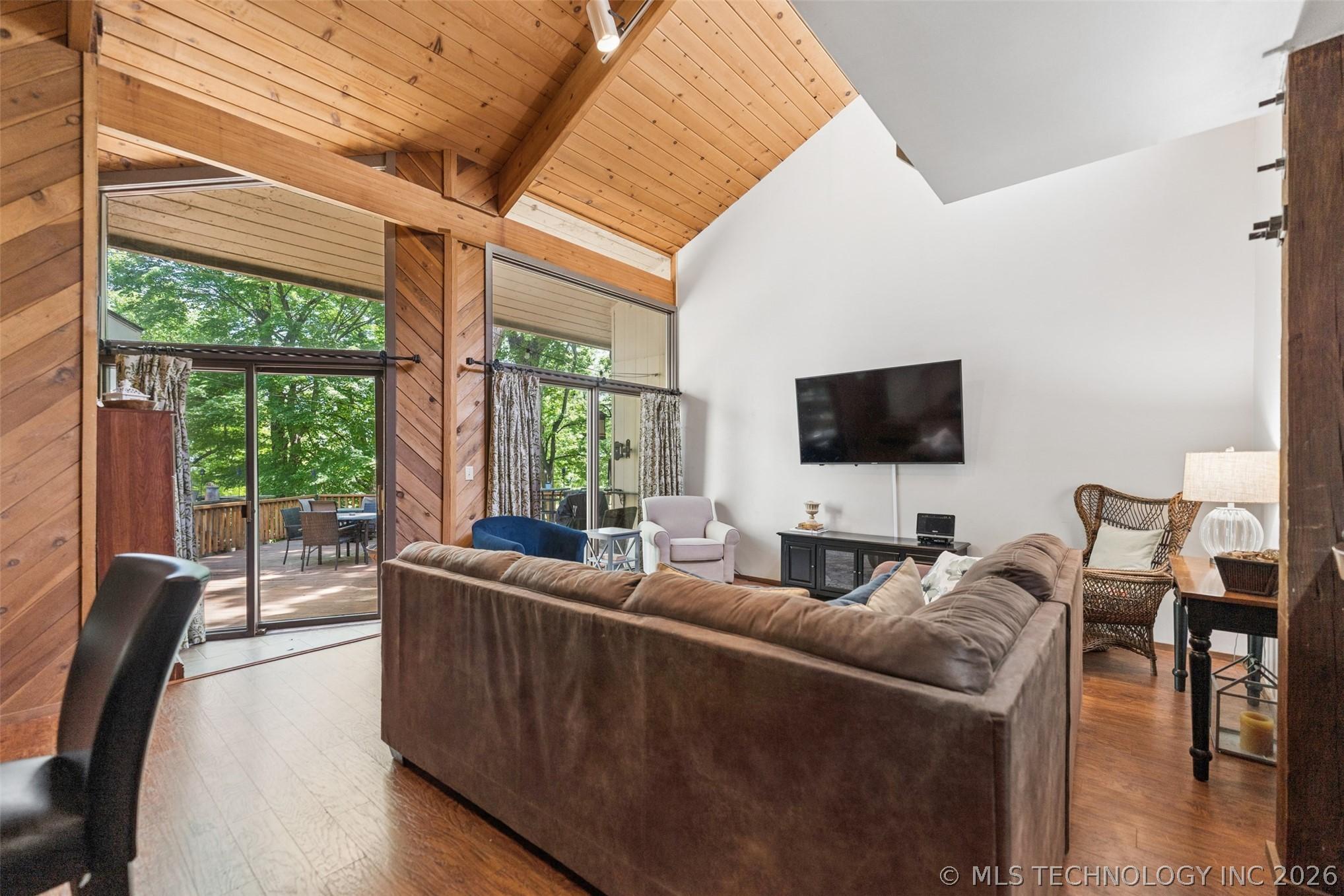Image 2: Vaulted wood-paneled ceilings with exposed beams