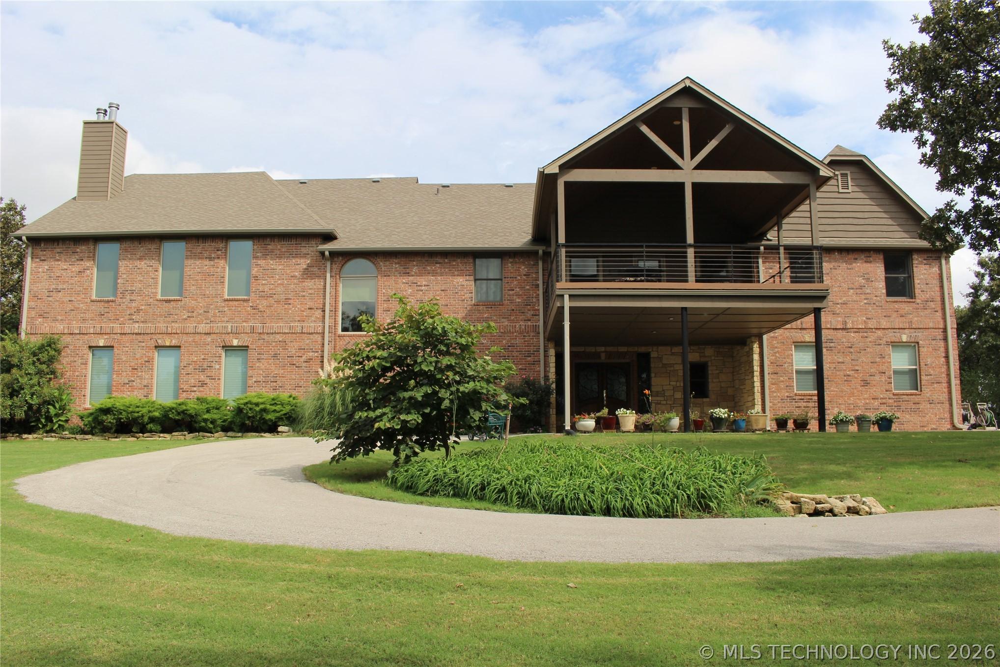 Image 2: Front view with porte cochere