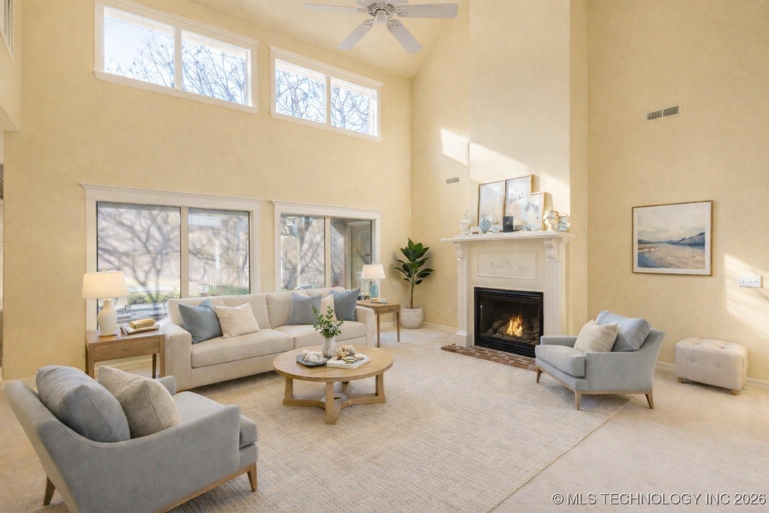 Image 3: Light-filled living room with soaring ceilings, ex