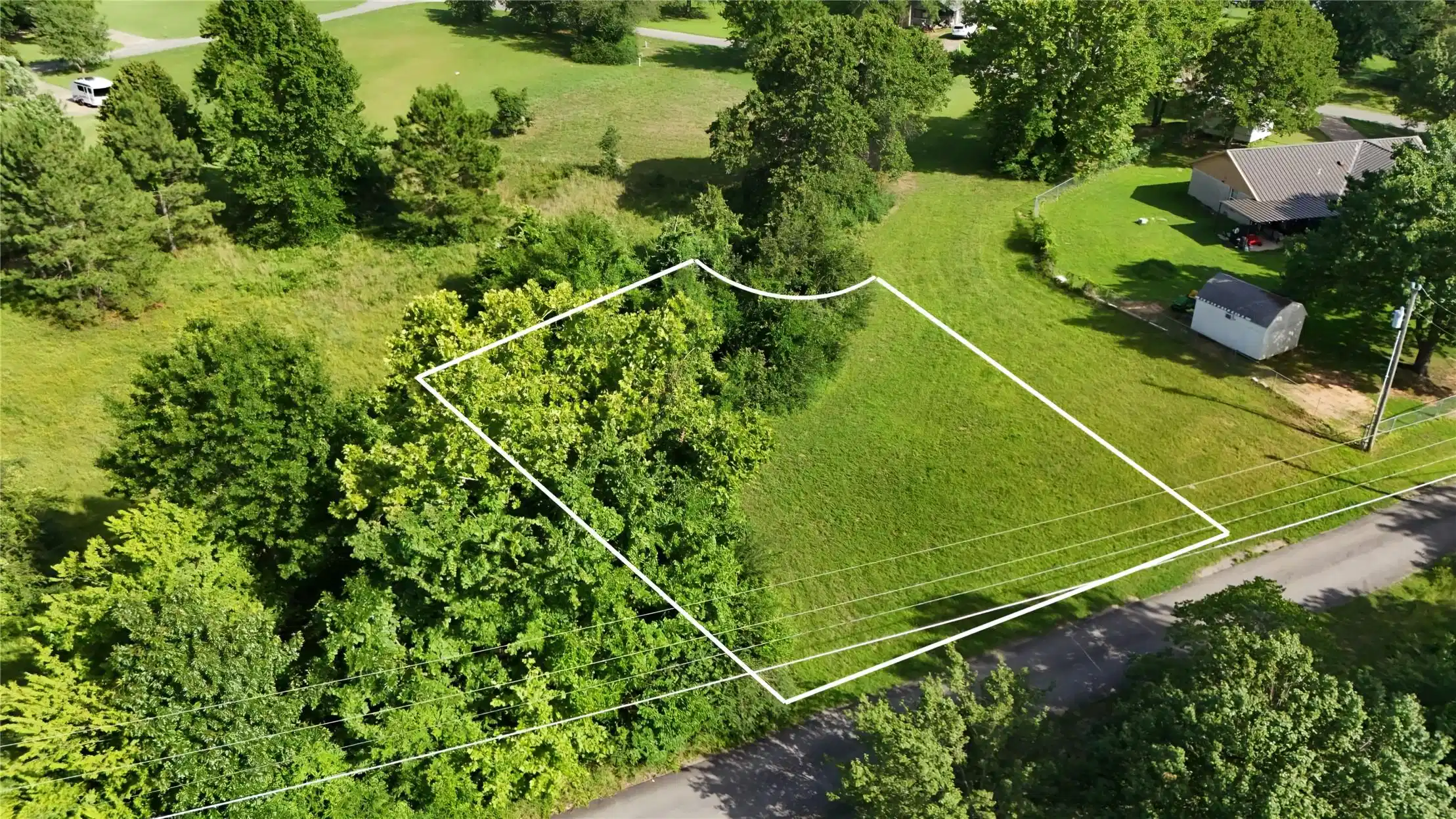 Image 1: Cleared lot featuring a combination of open grass