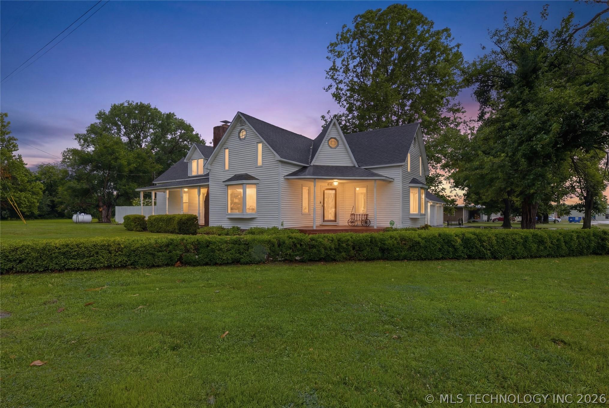 Image 1: Twilight view showcasing the home&rsquo;s distinctive Vi