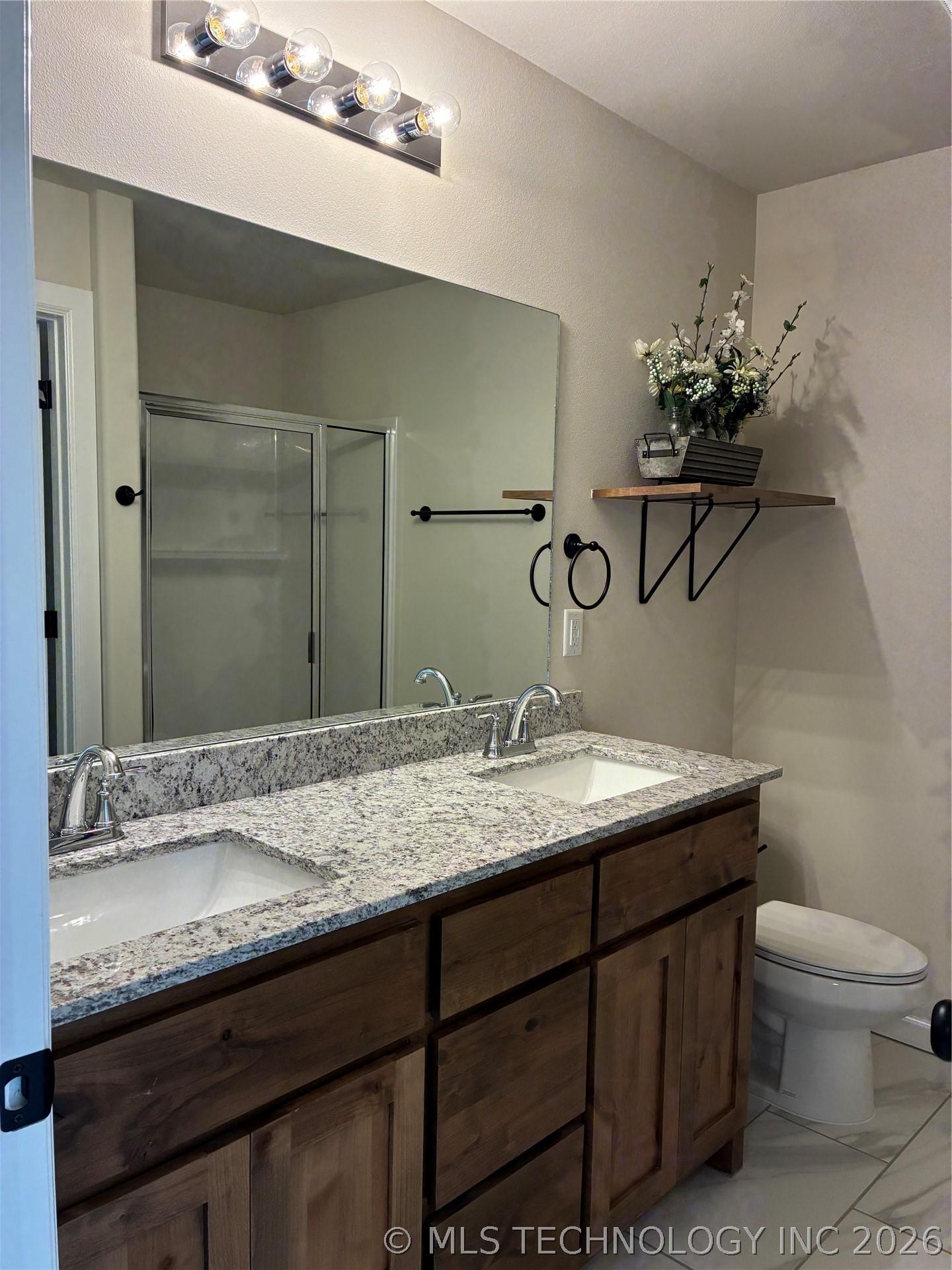 Image 4: Pics of same plan- master bathroom features dual s