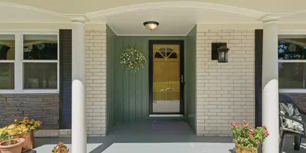 Image 2: Covered front entry featuring large front porch.