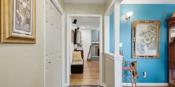 Image 4: Entryway featuring dark stone flooring.