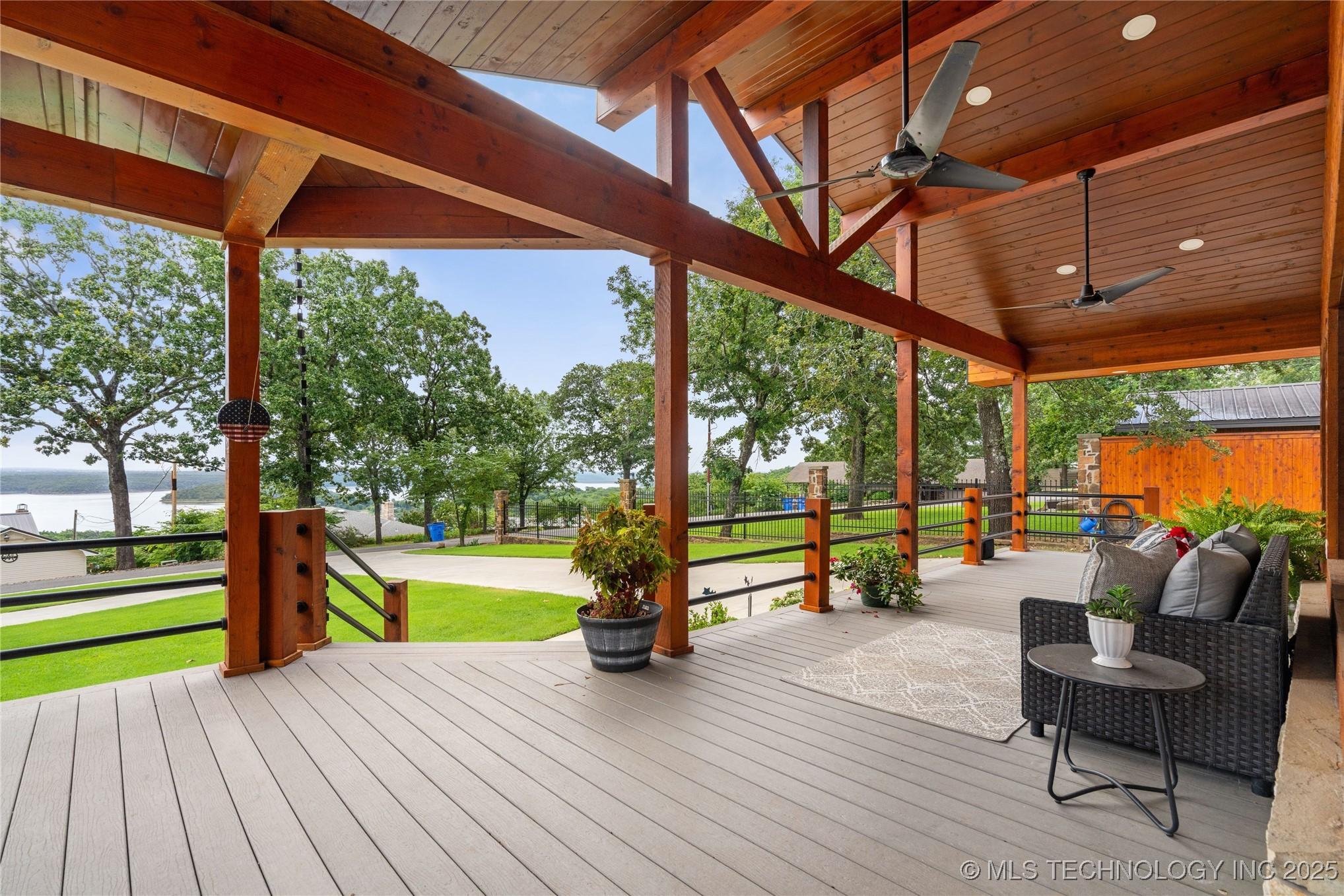 Image 1: Front porch sittin' at it's finest!