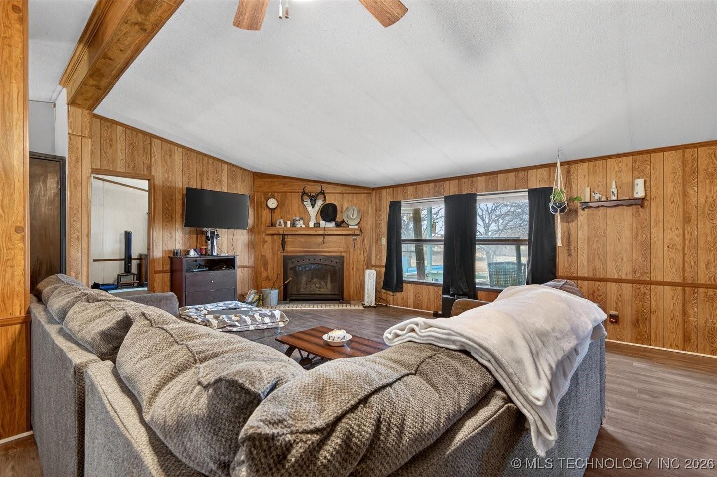 Image 4: Wood burning fireplace & vaulted ceilings