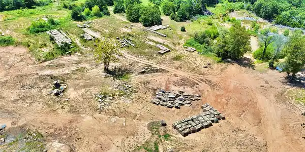 Image 4: Expansive cleared land parcel featuring a central