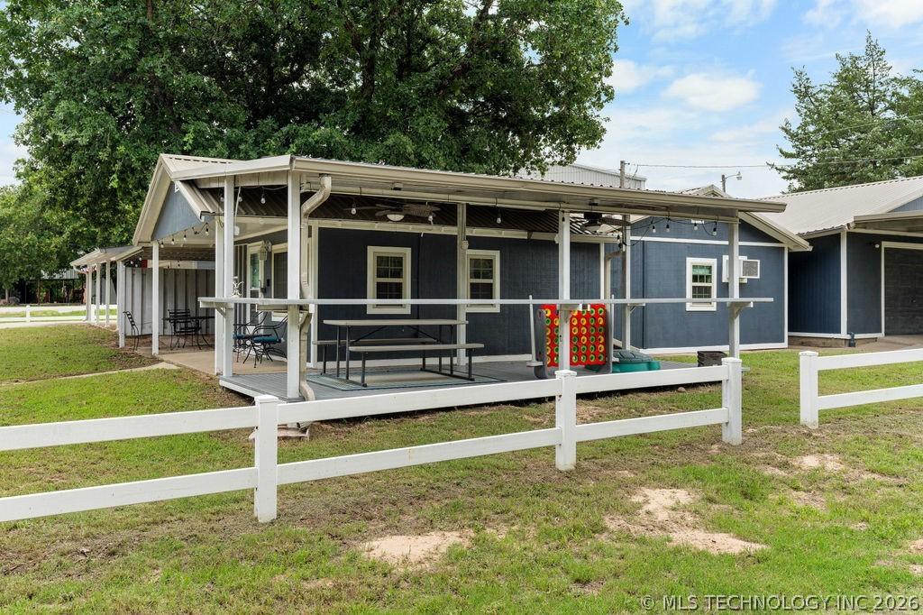 Image 1: Cabin with covered side patio