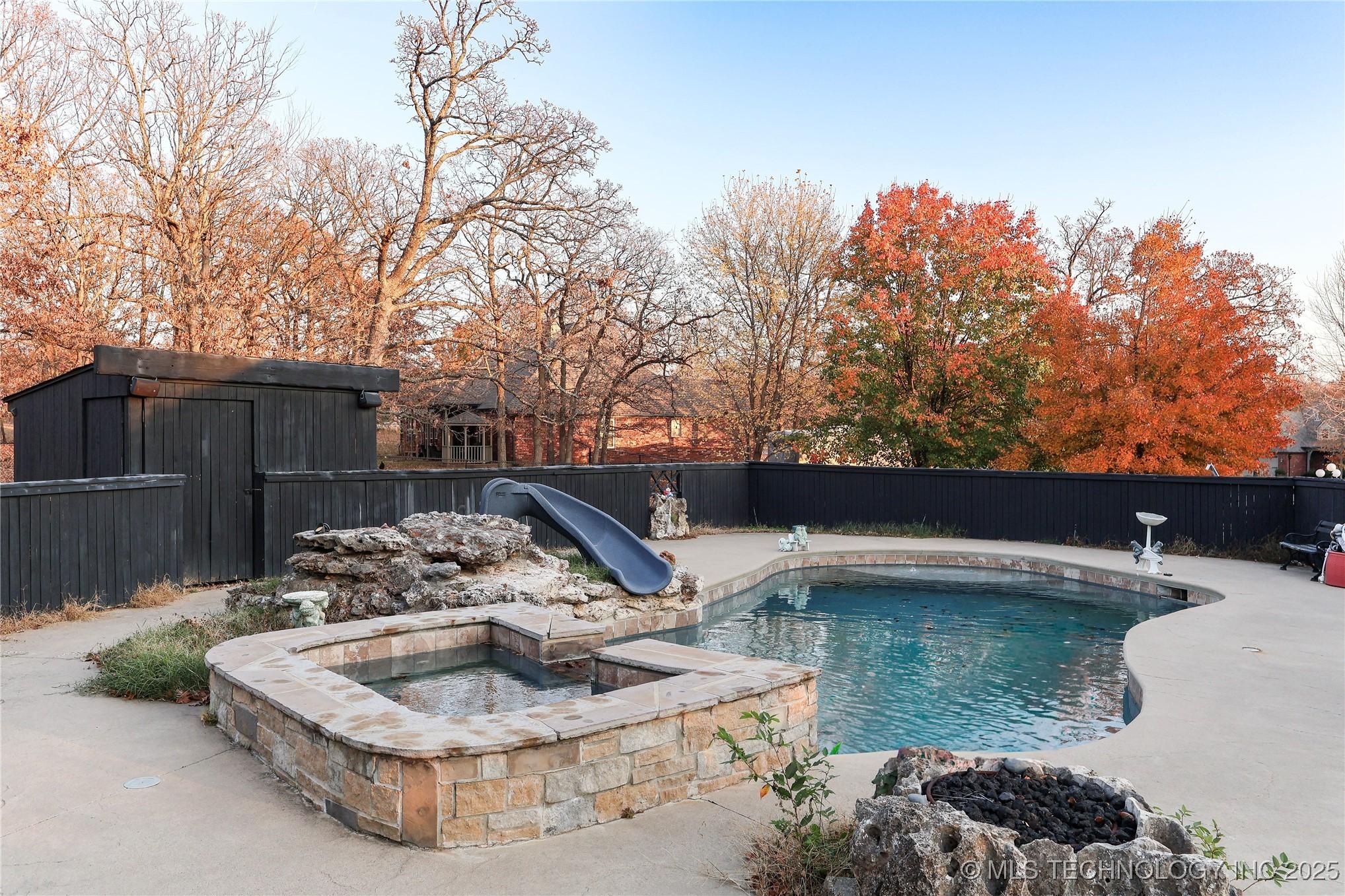 Image 3: Gas Poolside Firepit,Hot tub, Pool with Slide