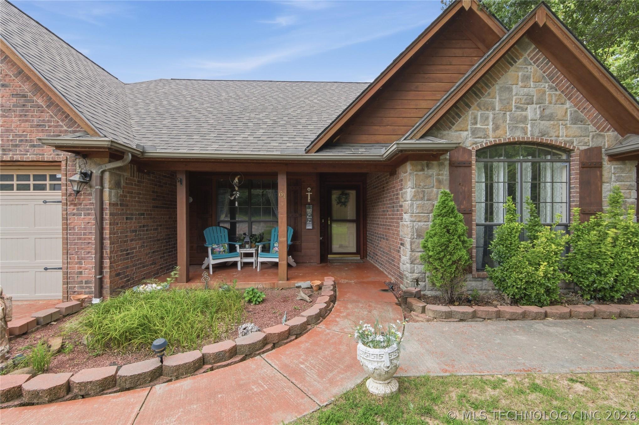 Image 3: Welcoming Covered Front Porch