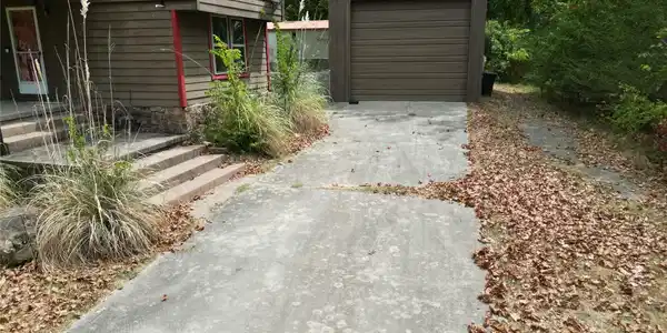 Image 4: SHOP AND SIDE DRIVEWAY OF HOME