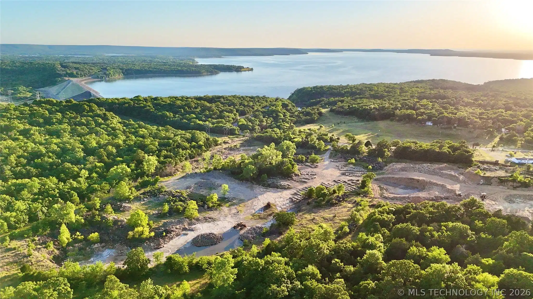 Image 1: Expansive natural landscape featuring a large body