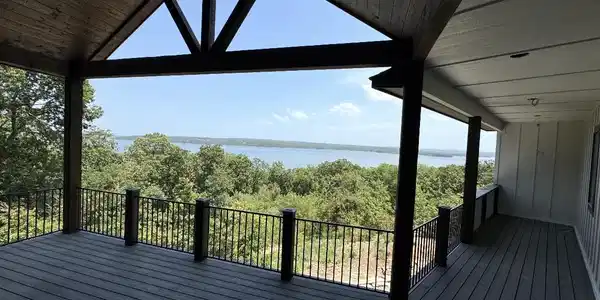 Image 3: Expansive covered deck featuring composite decking