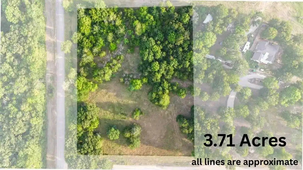 Image 1: Expansive 3.71-acre lot featuring a mix of mature