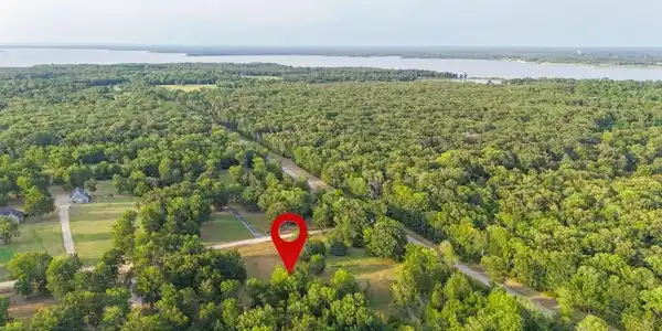 Image 3: Expansive wooded property featuring mature hardwoo