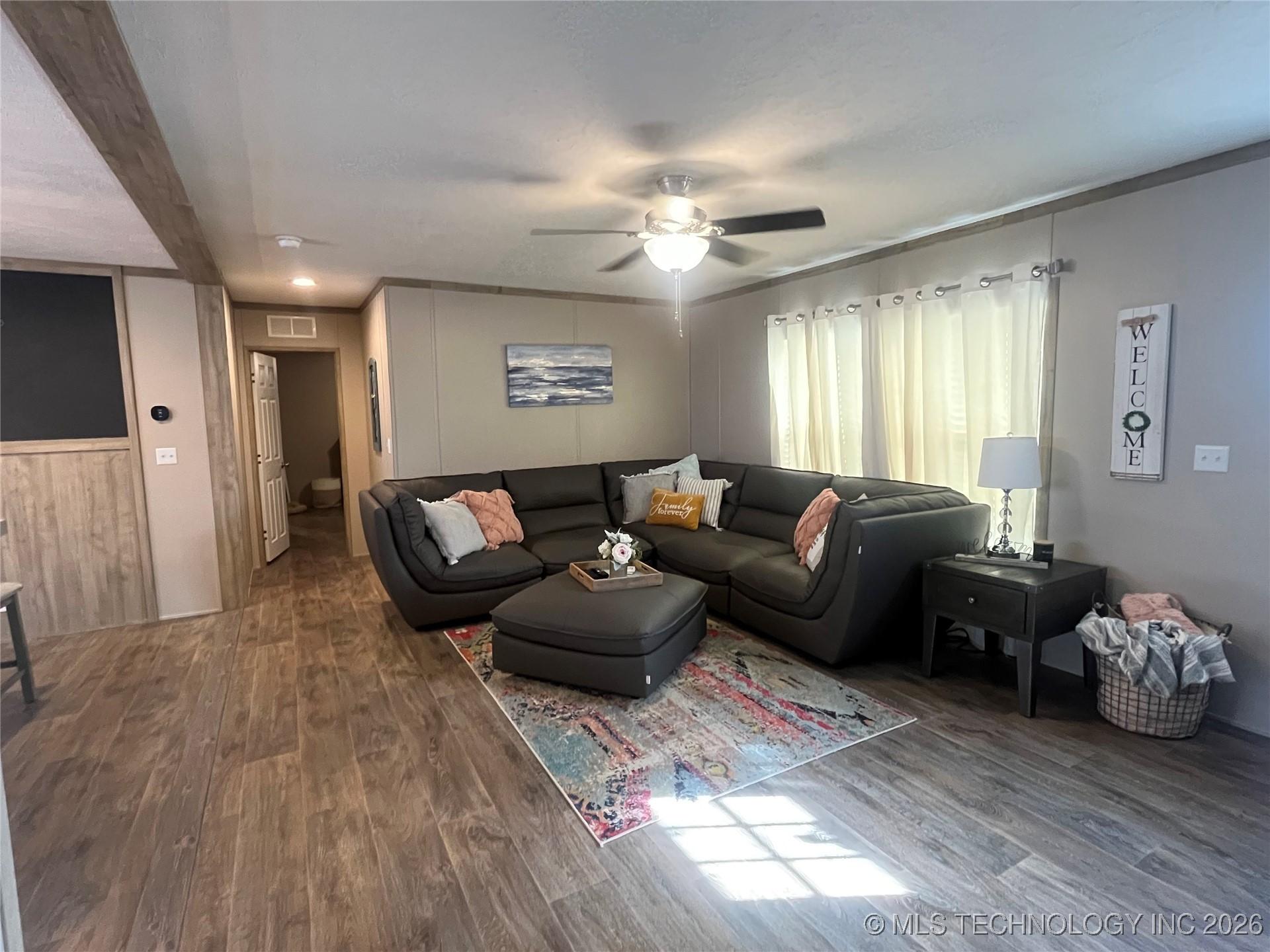 Image 3: Front living room as you walk in the front door