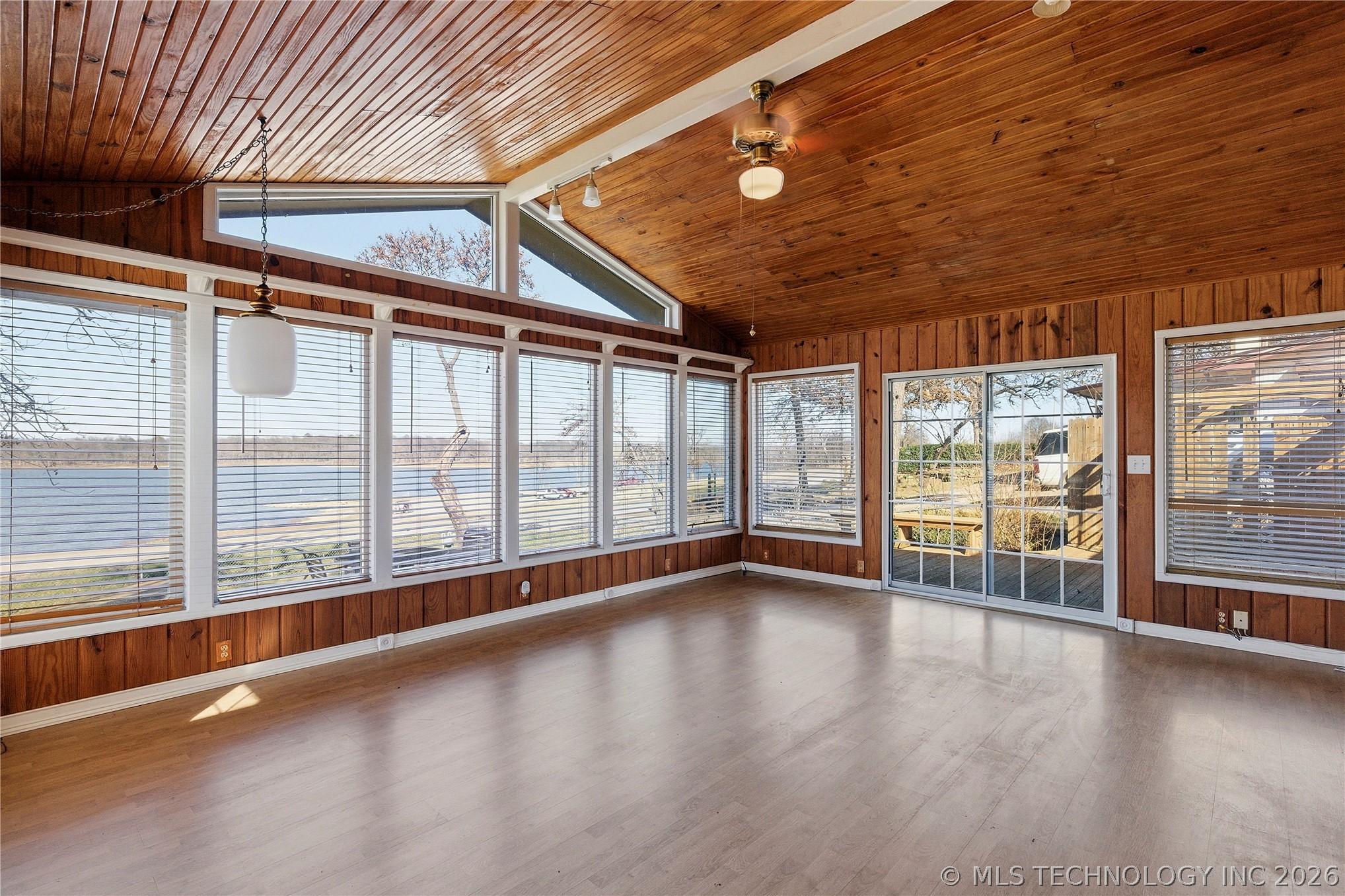 Image 3: Great room looking to the 2nd set of patio doors