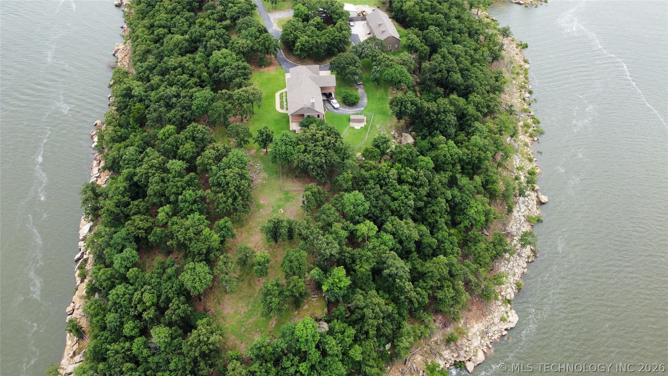 Image 3: Beautiful rock boulders surrounding property.